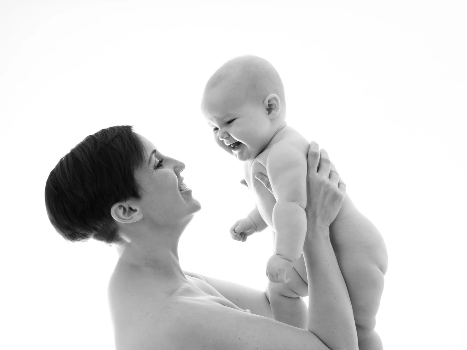 Mother holding her 6 month old